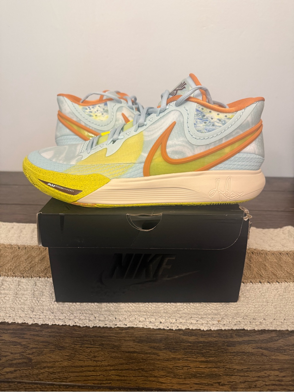 Nike Kids Light Blue Sneakers With Yellow & Orange Accents